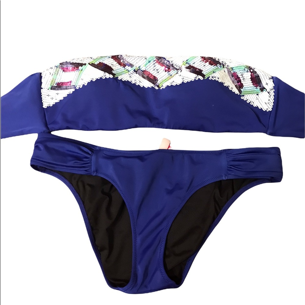 Victoria’s Secret bikini (small) and bottom blue sequins bandeau top (large)